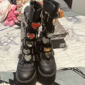 Selling black heart buckled demonias for 88 dollars